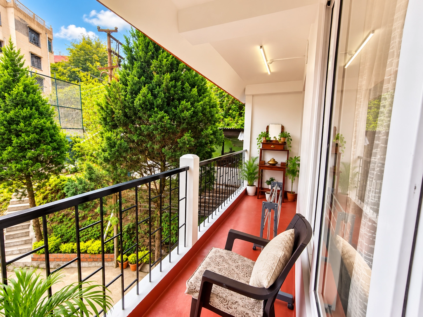 ARISAN guest balcony overlooking Shillong greenery